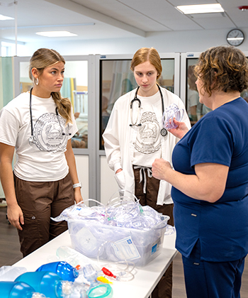 photo of nursing students with professor